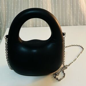 Sold out mini black dumbbell bag by Zara